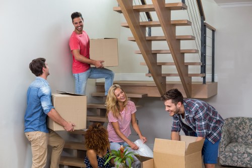 Moving team handling local removals in Falconwood on a residential street