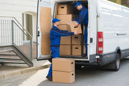 Local man and van loading items for a move in Falconwood