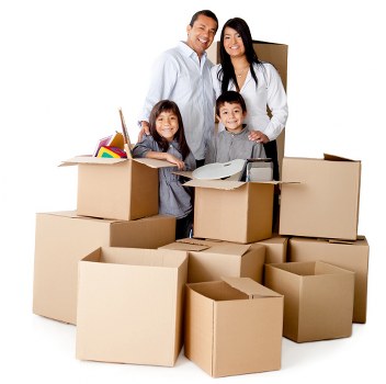 Professional movers carrying items through an apartment staircase